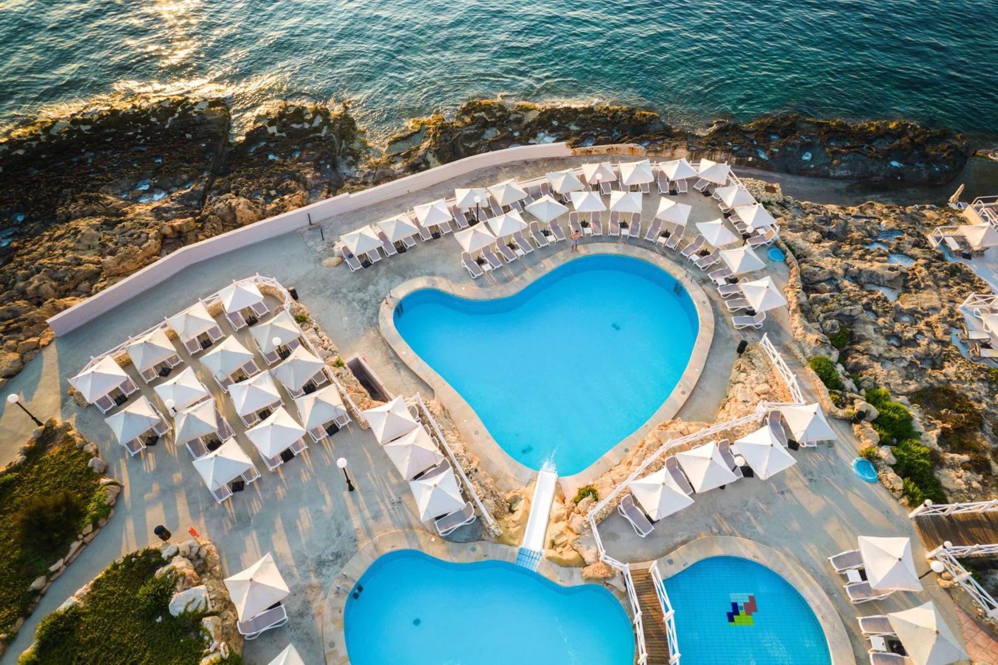 Radisson Blu Resort, Malta St. Julian'S Esterno foto Aerial view of the resort